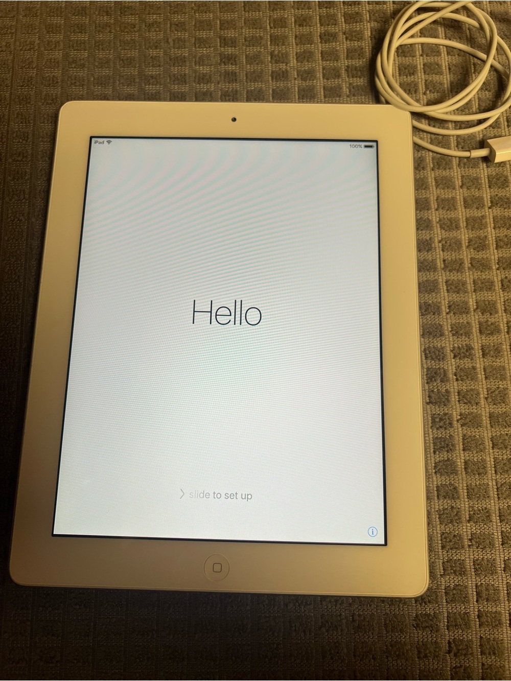 Apple White Tablet with Charger Cable